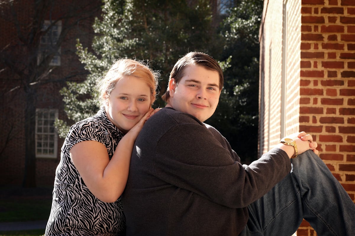 Family holding hands together